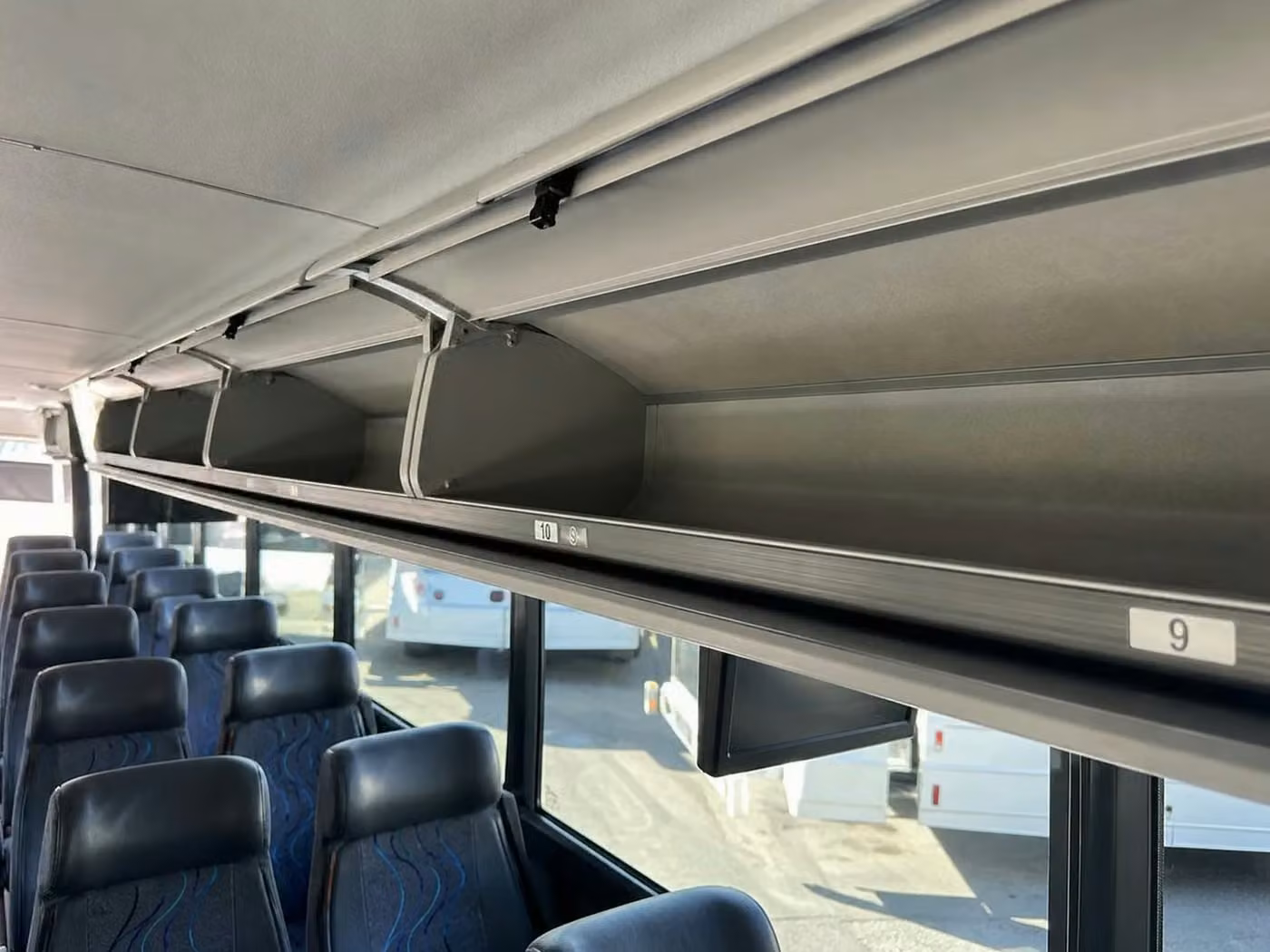 bullhead city 56 passenger charter bus overhead storage